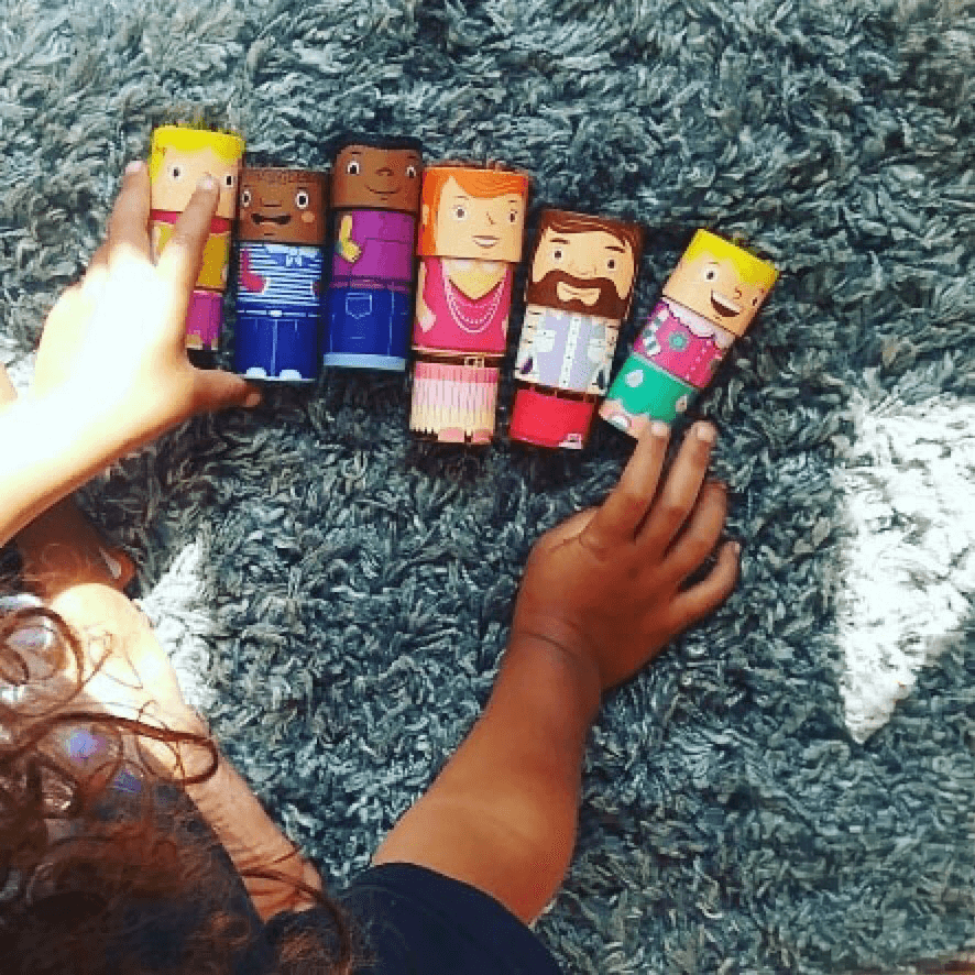 Children engaging with the 32-piece magnetic toy set, building diverse family figures through creative play