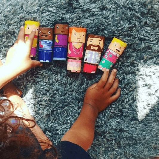Children engaging with the 32-piece magnetic toy set, building diverse family figures through creative play
