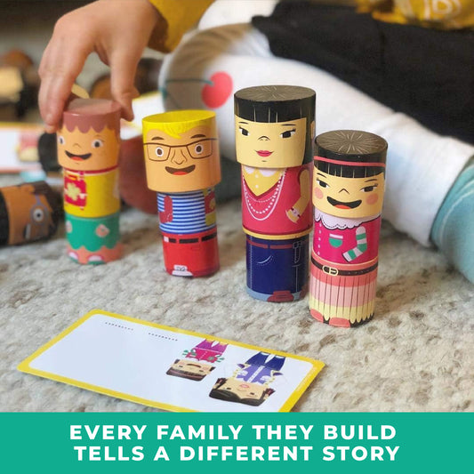 Toy figures being stacked with a card featuring illustrations of the same, on a textured surface.