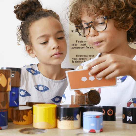 Children playing with the 48-piece magnetic family set, fostering creativity and social skills