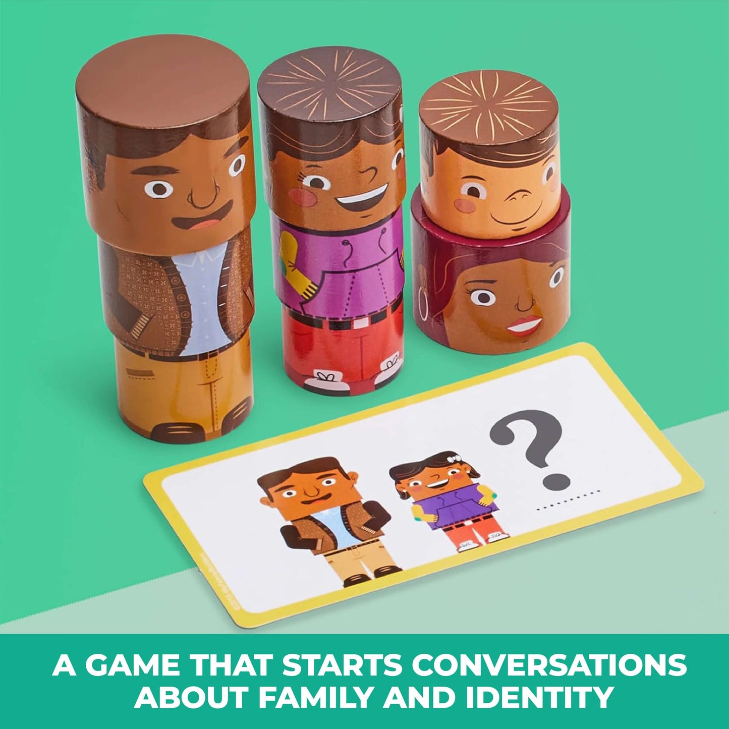 Diverse magnetic wooden family figures with activity card on green background, a game that starts conversations about family identity